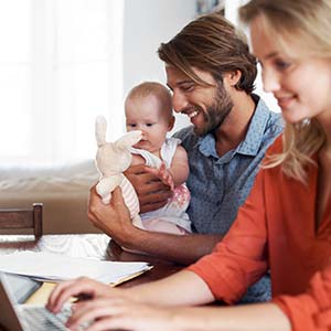 Young couple looking at their health spending account.